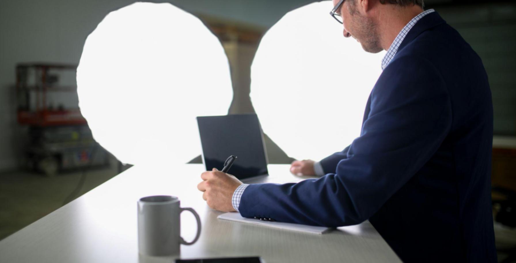 Business finance consultation session showing professional discussing financial concepts