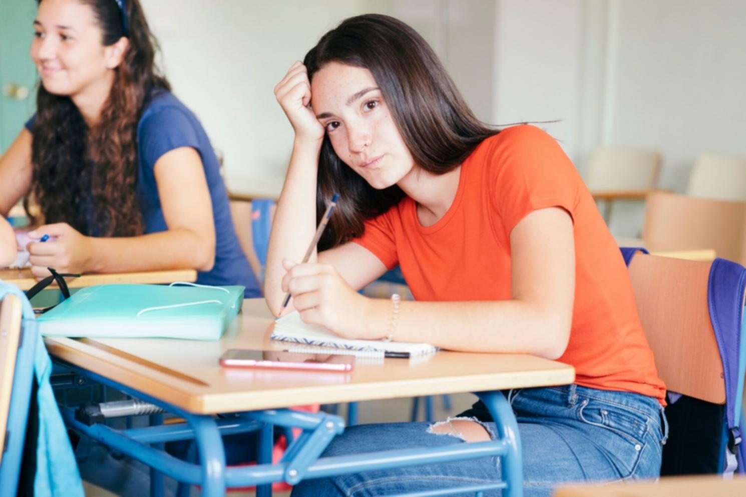 Finance education classroom setting with students engaged in practical learning exercises