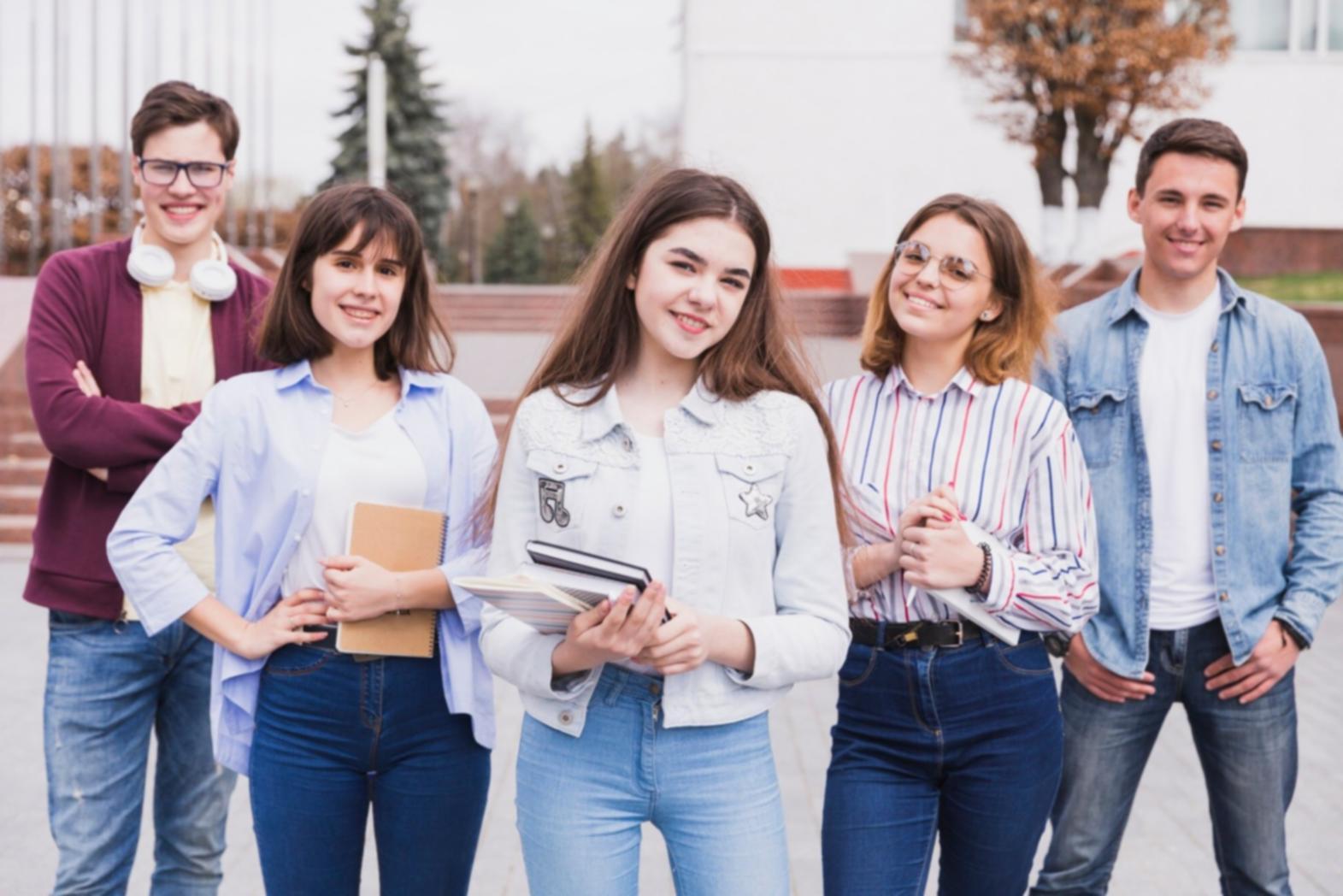 Business professionals reviewing financial documents and charts in a collaborative learning environment